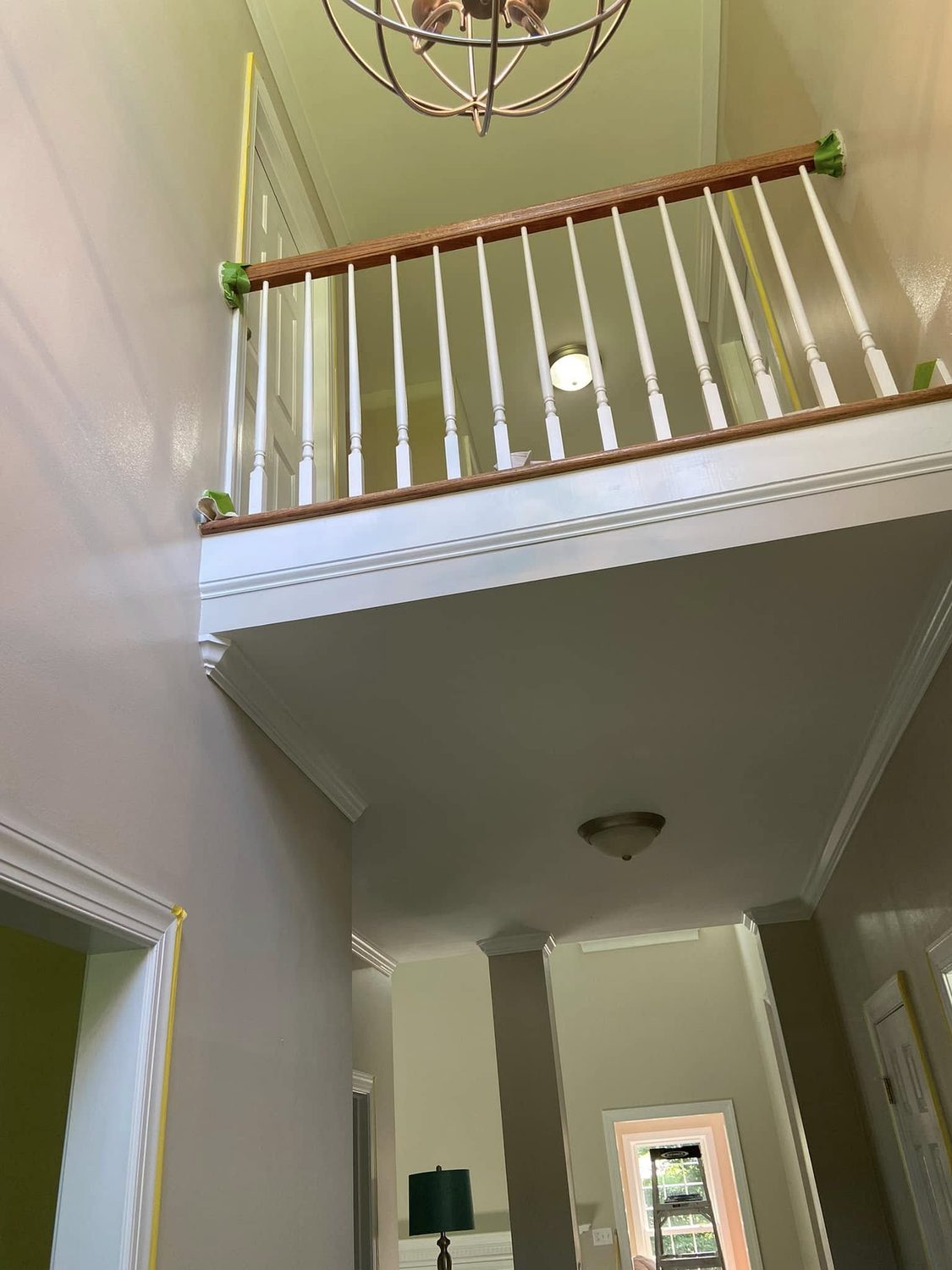 Stair rail and spindles cut in by hand by Carolina Superior Painting LLC