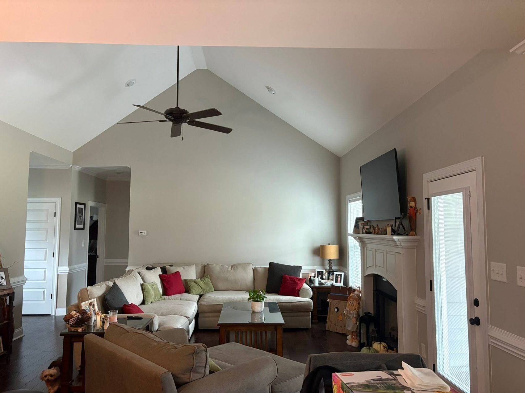 A vaulted living room, fresh through by Carolina Superior Painting LLC